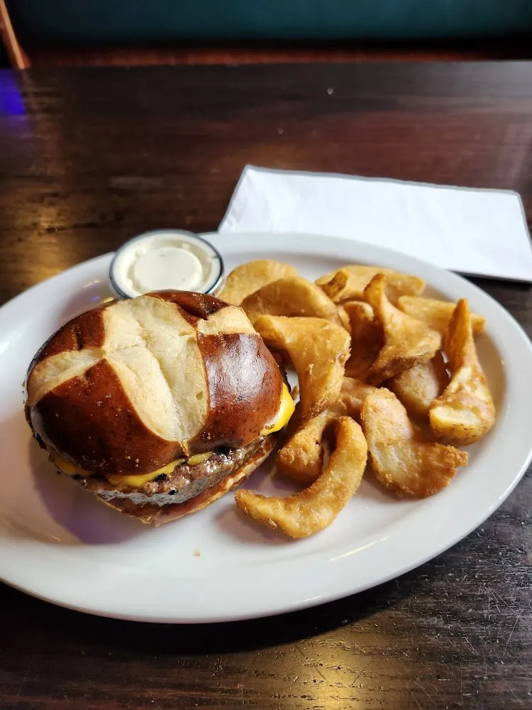 Cheese Burger on a Pretzel Bun with Sidewinder Fries